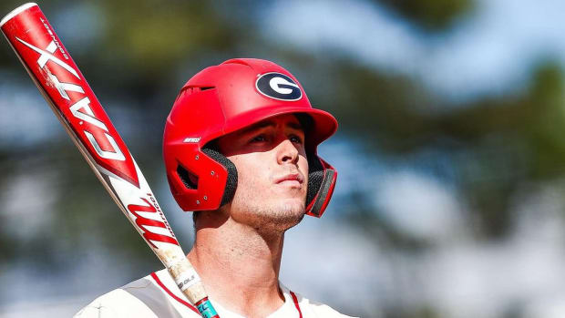All-American Georgia slugger Charlie Condon looks on as he awaits an at-bat.